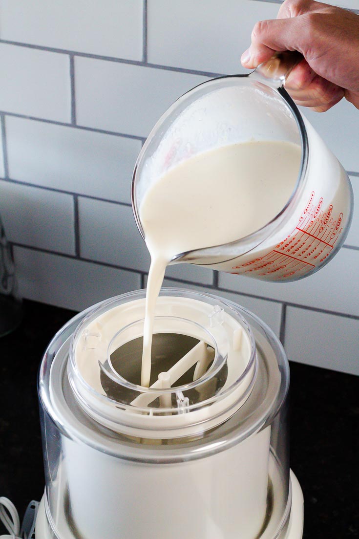 pouring ice cream base mixture into ice cream maker