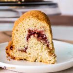 Slice of lingonberry cake on a white plate