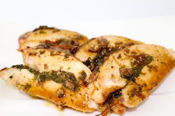 Sun Dried Tomato, Basil Pesto, Black Olive & Feta Stuffed Chicken. Easy recipe under 45 minutes