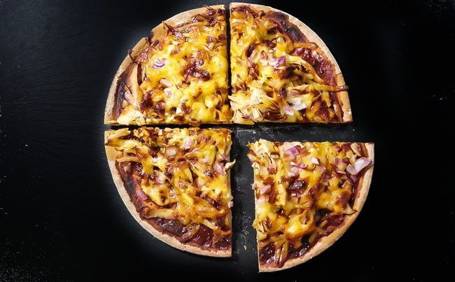 This Easy BBQ Chicken Pizza Recipe was made our Spicy Orange BBQ Sauce. The Pizza is citrus, tangy, spicy and of course with strong BBQ flavor. Find this recipe and the BBQ Sauce at Spoonabilities