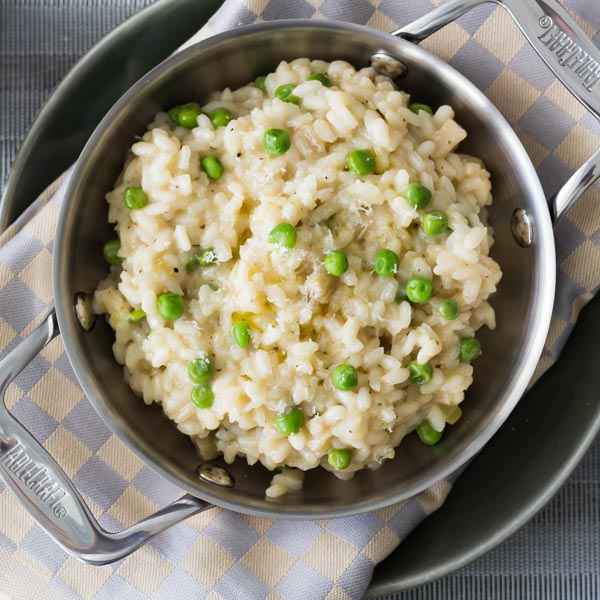 Easy Parmesan Artichoke Risotto. Featuring one of our favorite products Artichoke Parmesan Tapenade. Find this product and more easy recipes at Spoonabilities.com