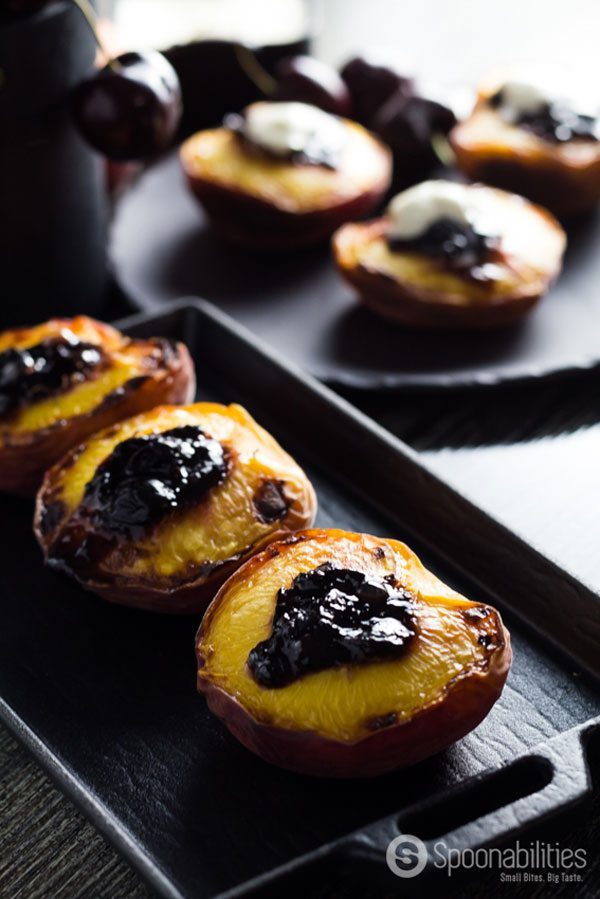 Stone Fruit Season Broiled Peaches with Spiced Sour Cherry Spread. Very easy and quick recipe for any day of the week as a light dessert or as appetizer dessert. Find this recipe and more at Spoonabilities.com