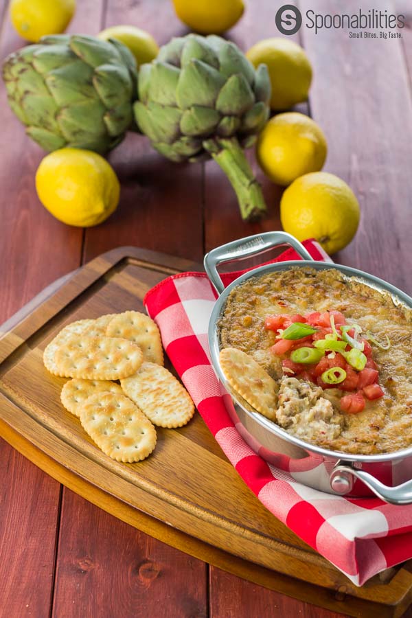 Asiago Crab Artichoke Dip is an easy recipe appetizer made under 30 minutes. This dip is lemony, cheesy and the meaty. Spoonabilities.com