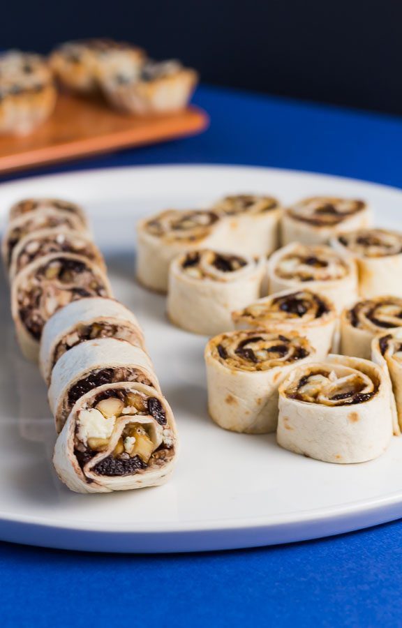 Fig Almond & Brie Roll Ups on a white plate