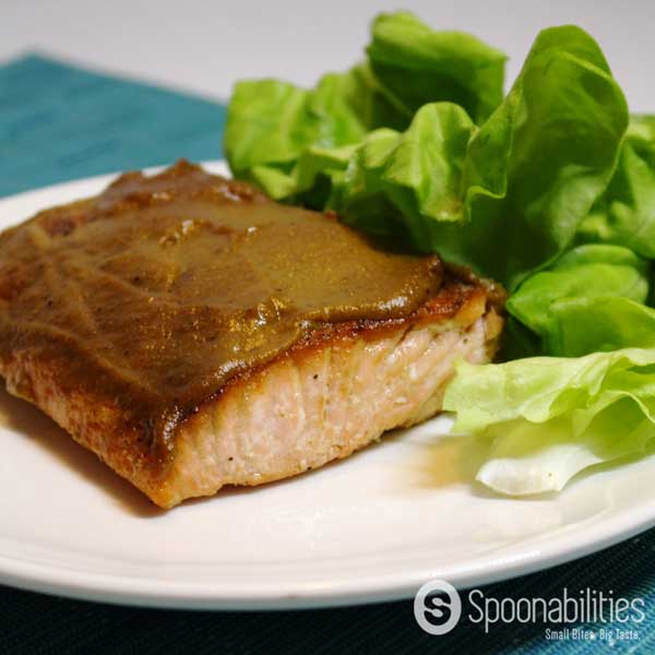 Salmon recipe with a Pumpkin Honey Mustard Glaze. Perfect for the Fall Season or any time of the year. This is my go-to recipe when I cook salmon. Easy to make and the mustard glaze keeps the salmon moist. You can make this dish in 15 minutes. Spoonabilities.com