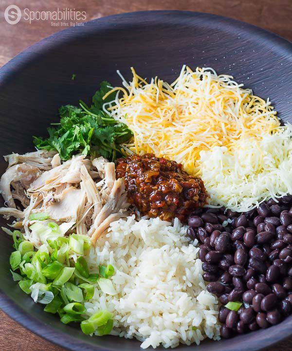 Separated ingredients for Southwestern Chicken Wraps in a gray bowl