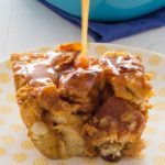 L’Epicurien Salted Butter Caramel Spread pouring down on piece of Pumpkin Bread Pudding