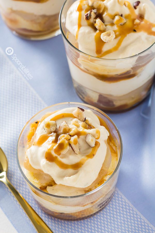 Easy Salted Caramel Pear Trifle recipe has flavored whipped cream piped between layers of pound cake, poached pears, Coop's Salted Caramel Sauce. Available at Spoonabilities.com