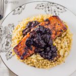 Recipe for Chipotle Cherry Sauce over Broiled Salmon on a bed of Lemony Israeli Couscous, featuring Black Cherry Jam, available at spoonabilities.com