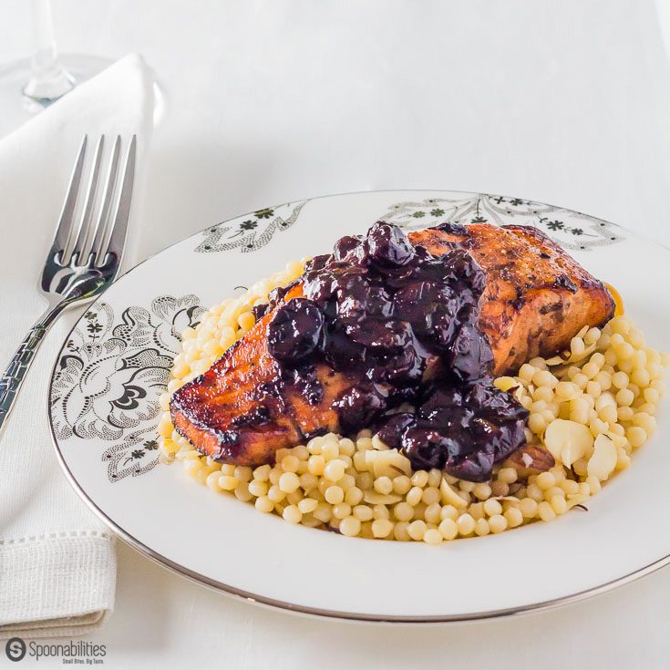 Black Cherry Jam is the main ingredient in this Chipotle Cherry Sauce recipe over Broiled Salmon with Israeli Couscous. spoonabilities.com