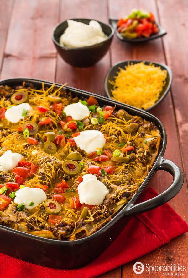 Cinco de mayo food of Full baked Lasagna with olives, sour cream and cheese