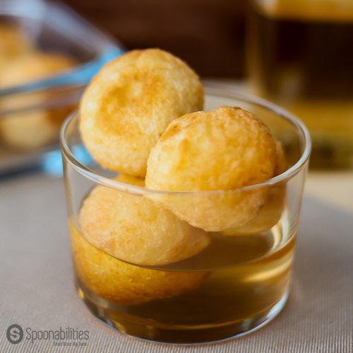 Immigrant Food Story about Fried Dough Balls recipe - my Dominican dessert recipe Buñuelos usually served during Easter week. Spoonabilities.com