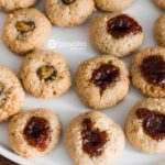 Plate of Walnut Macaroon Thumbprint Cookies