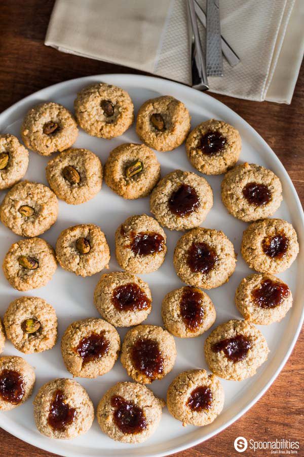 Large round plate of Walnut Macaroon Thumbprint Cookies 