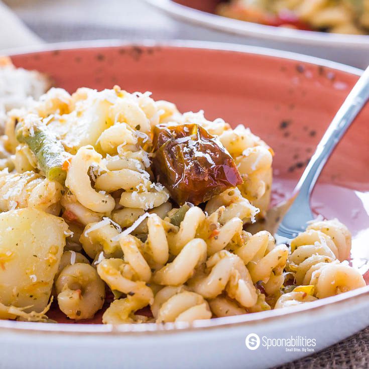 Artichoke Lemon Pesto Pasta Salad with Green Bean and Potato is an easy recipe perfect for barbecues and summer parties. Available at Spoonabilities.com