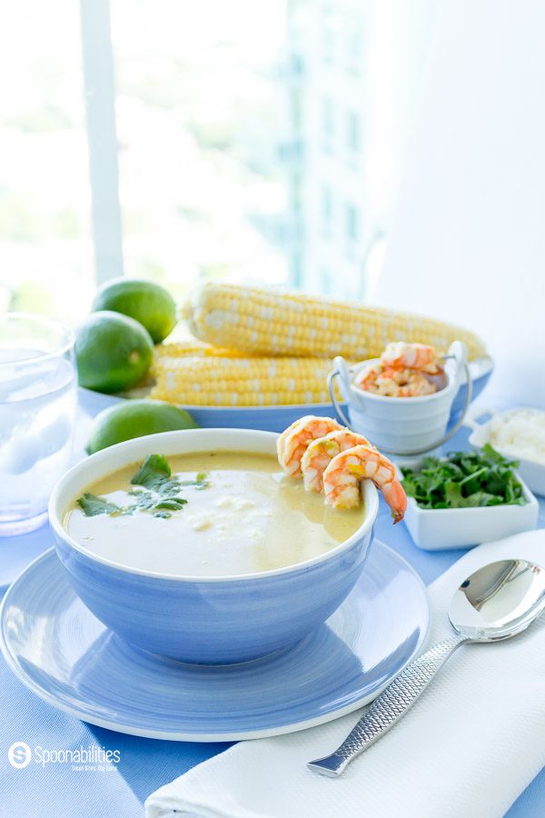 Mexican Inspired recipe: Presented in a beautiful light Blue Bowl this Creamy Hatch Green Chile Soup is packed with fresh flavors with Hatch Chile Pesto