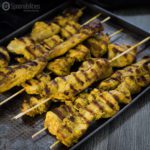 Grilled Chicken Satay Skewers are marinated overnight in peanut sauce. This recipe is super easy to make and fun to eat. Spoonabilities.com