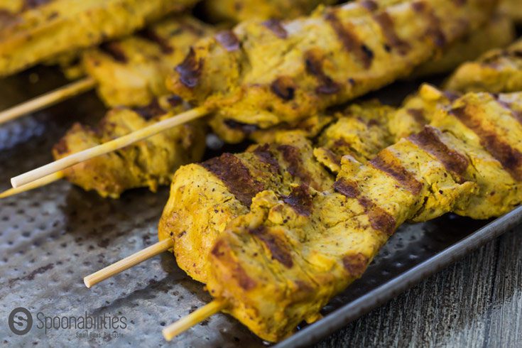 Grilled Chicken Satay Skewers are marinated overnight in peanut sauce. Super easy recipe to make and fun to eat. Spoonabilities.com
