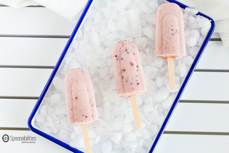 Coconut Cream Lingonberry Pops are creamy and naturally sweet with maple syrup. Yummy popsicles are Vegan, Gluten-Free, Dairy-Free & Paleo. Spoonabilities.com