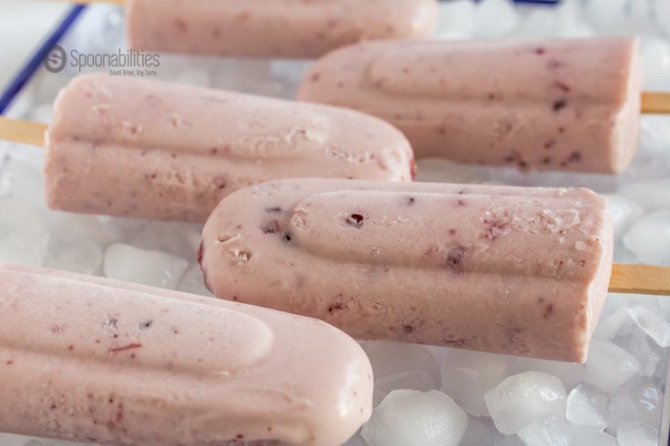 Coconut Cream Lingonberry Pops are creamy, sweet & refreshing. These popsicles are your new summer cool-down dessert. Spoonabilities.com