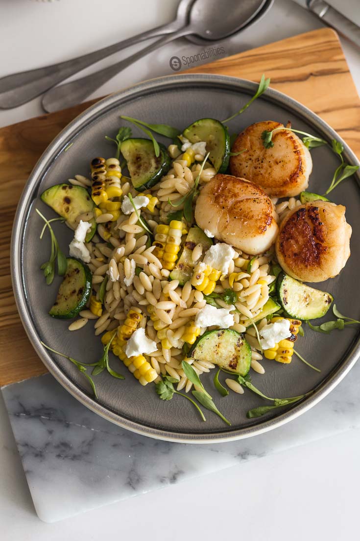 The Grilled Corn Zucchini Orzo Salad is one of the best salad recipes with an excellent texture and flavor for a perfect bite. Spoonabilities.com