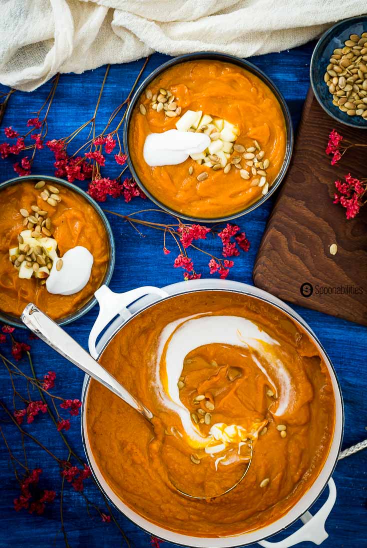 Serve Roasted Pumpkin Bisque in a bowl with a center mixture of chopped Granny Smith Apple, roasted pumpkin seeds and whipped coconut cream. Spoonabilities.com