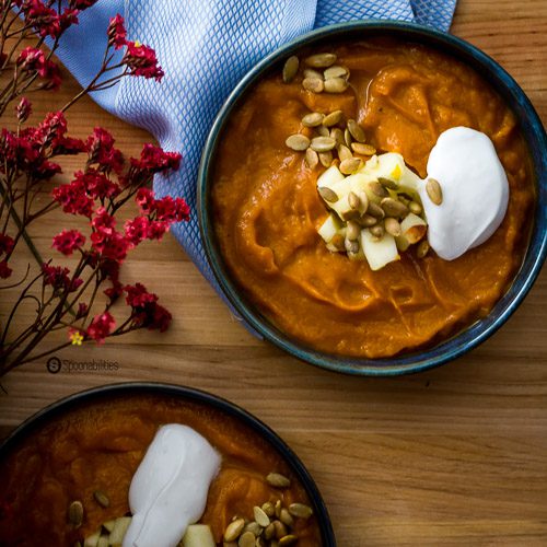 Roasted Pumpkin Bisque is a healthy vegetarian Fall comfort food recipe for any week night or Thanksgiving dinner. Dairy-free, Gluten-Free & Paleo soup recipe. Spoonabilities.com