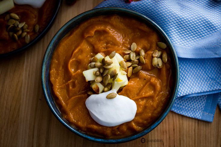 Roasted Pumpkin Bisque is the perfect creamy comfort soup for any cold night during the fall/winter season or as a first course for Thanksgiving dinner. Spoonabilities.com