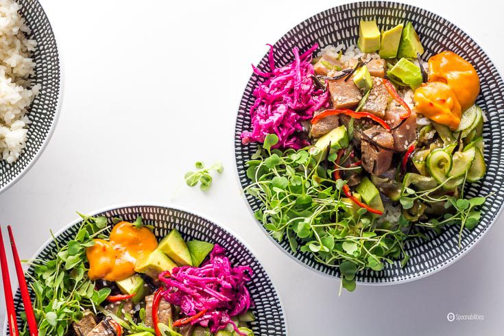 Spicy Tuna Poke Bowl is an easy #appetizer or lunch recipe. You can make this restaurant quality #pokebowl at home. This Hawaiian salad has sushi rice, sushi grade Yellowfin tuna, seaweed, cucumber, jalapeño, scallions in a citrusy ponzu sauce and Hot Pink Mayonnaise. Spoonabilities.com