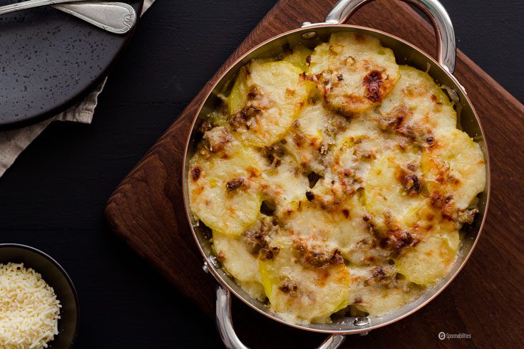What is the difference between scallop potato and potato gratin? Here’s my research from making this Leek & Potato Gratin side dish recipe. Spoonabilities.com