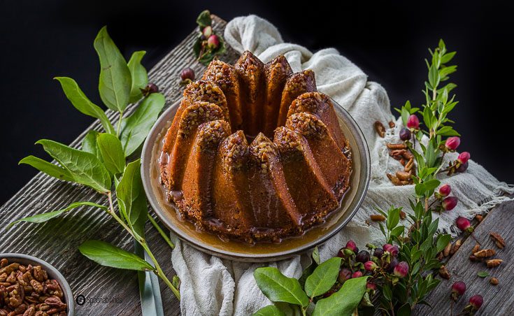 Pecan Pie Bundt Cake is a rich dessert. The Kugelhopf Bundt Pan gives a dramatic and distinctive angled cake, and allows the syrup to glide through the sweeping towers. Spoonabilities.com