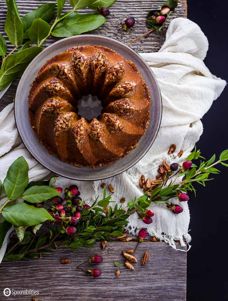 Pecan Pie Bundt Cake is a luscious and moist dessert. A great addition to your dinner table during this holiday season for Thanksgiving or Christmas dinner. Spoonabilities.com