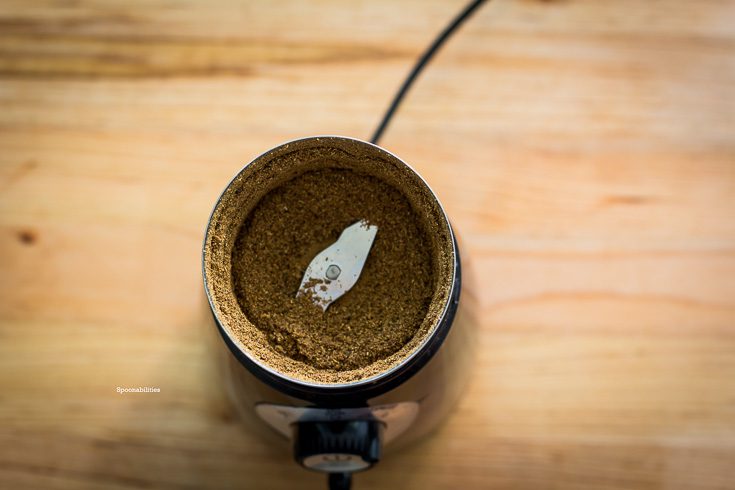 Grinded toasted fennel and peppercorn in the electric grinder, ready for pork porchetta stuffed with ground pork. Spoonabilities.com