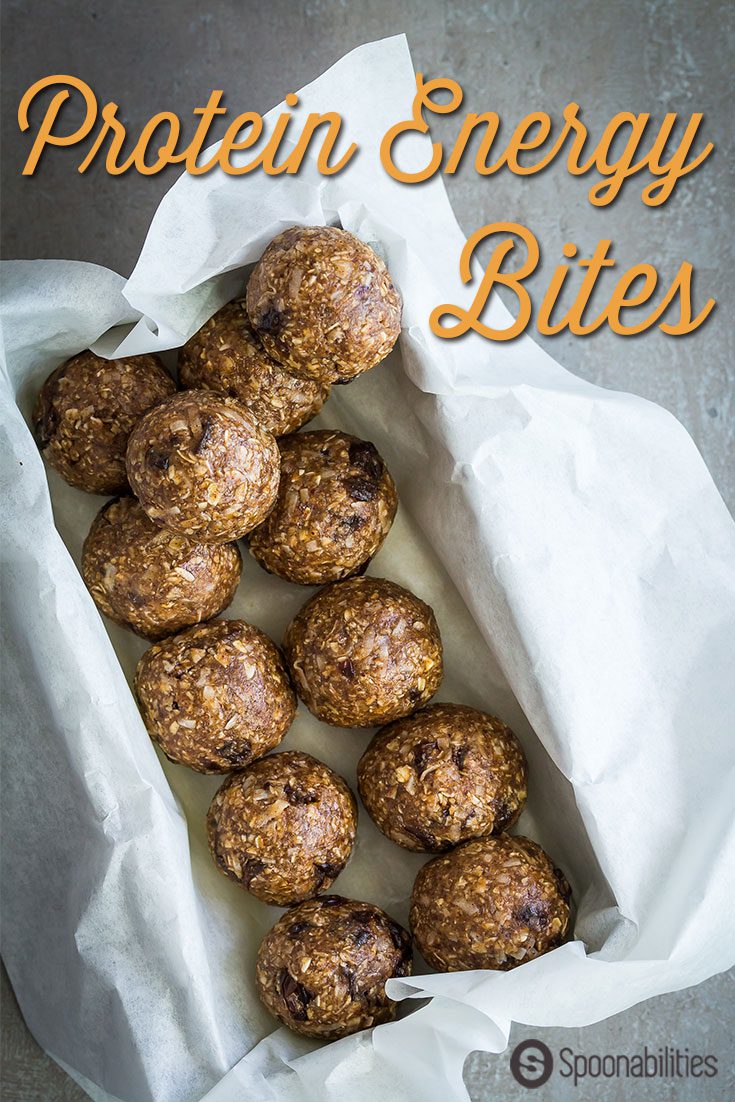 Protein Energy Bites are easy to make and no baking is required. Healthy snack bites loaded with quick-oats, almond butter, cocoa nibs, raisins, unsweetened coconut flakes, honey, and protein meal replacement by Naked Nutrition.