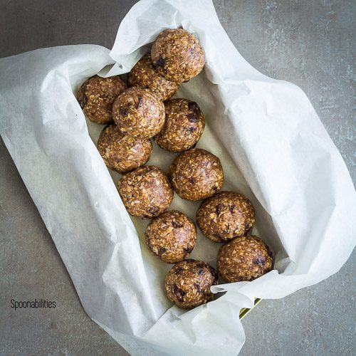 Protein Energy Bites is an easy to make, no bake recipe. Protein packed snack with oats, protein meal replacement, almond butter, cocoa, raisins, & coconut. Spoonabilities.com