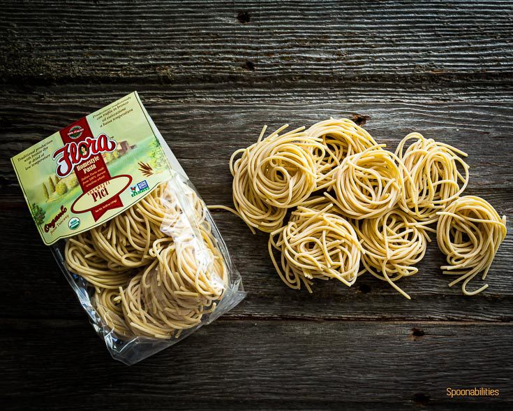 Flora Fine Foods Organic spaghetti Pici pasta in the package and another one outside the package. Spoonabilities.com