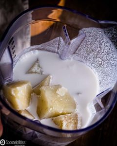 Blender jar with White sweet potato & milk mixture before been blended. Spoonabilities.com