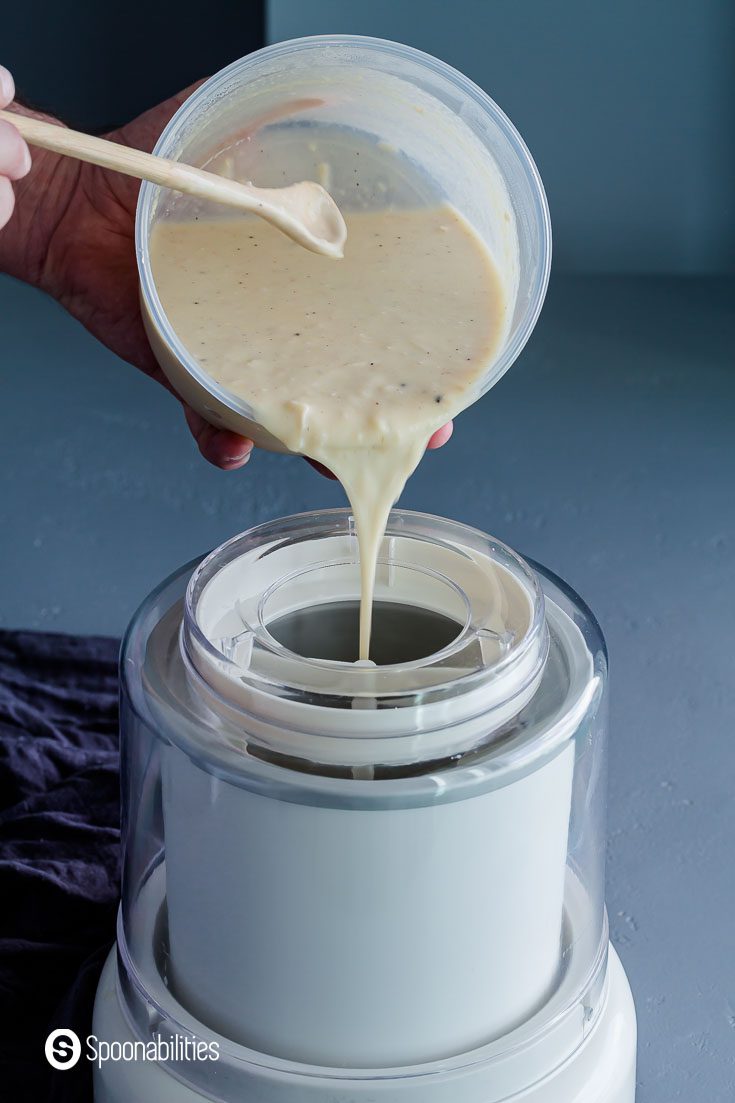 Adding the ice cream base to the ice cream maker. Recipe at Spoonabilities.com