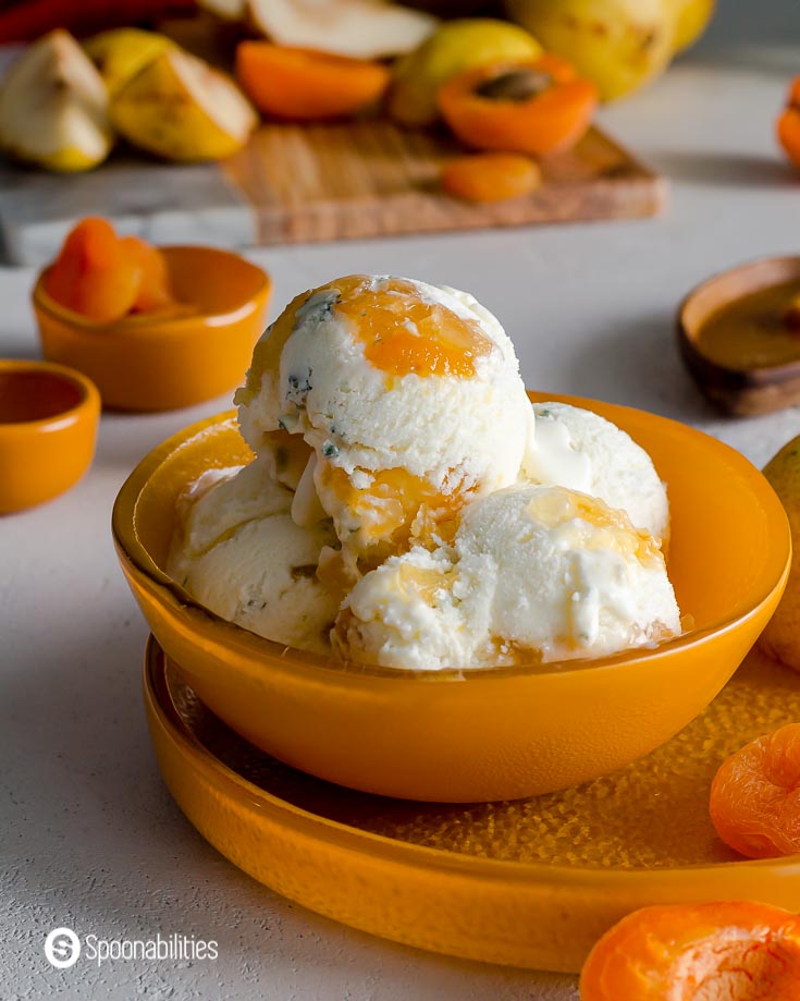 An orange bowl with 4 ice cream balls. Recipe at Spoonabilities.com