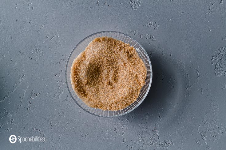 A small bowl with brown sugar, white sugar, and xanthan gum. Recipe at Spoonabilities.com