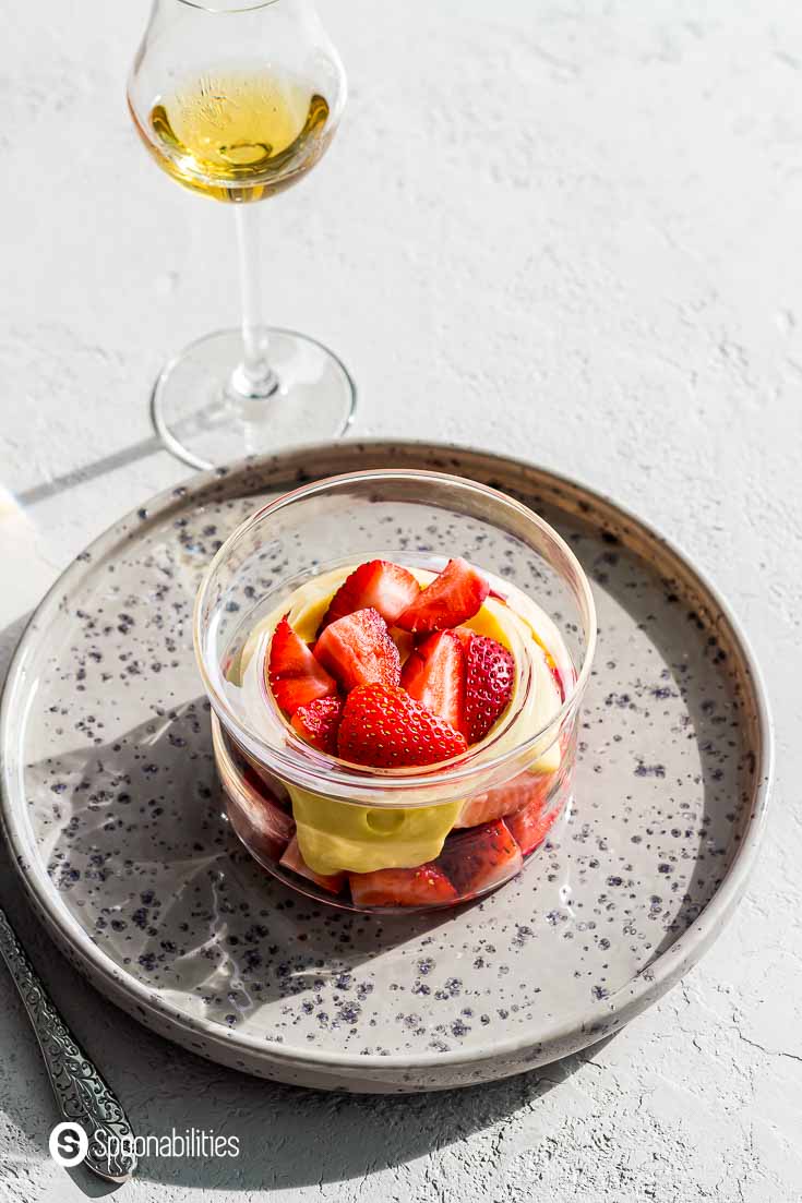 Close up of this Italian dessert, served in a small glass bowl with fresh strawberries. More about this recipe at Spoonabilities.com