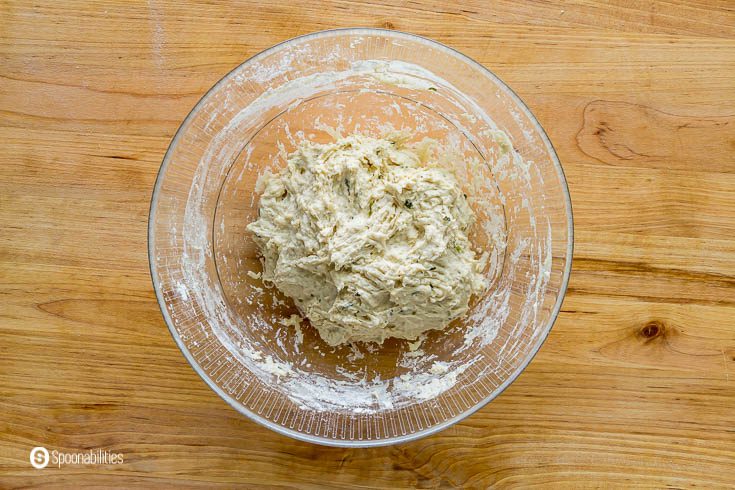 Wet and dry ingredients mixed in a glass bowl and formed into a dough. Recipe at Spoonabilities.com