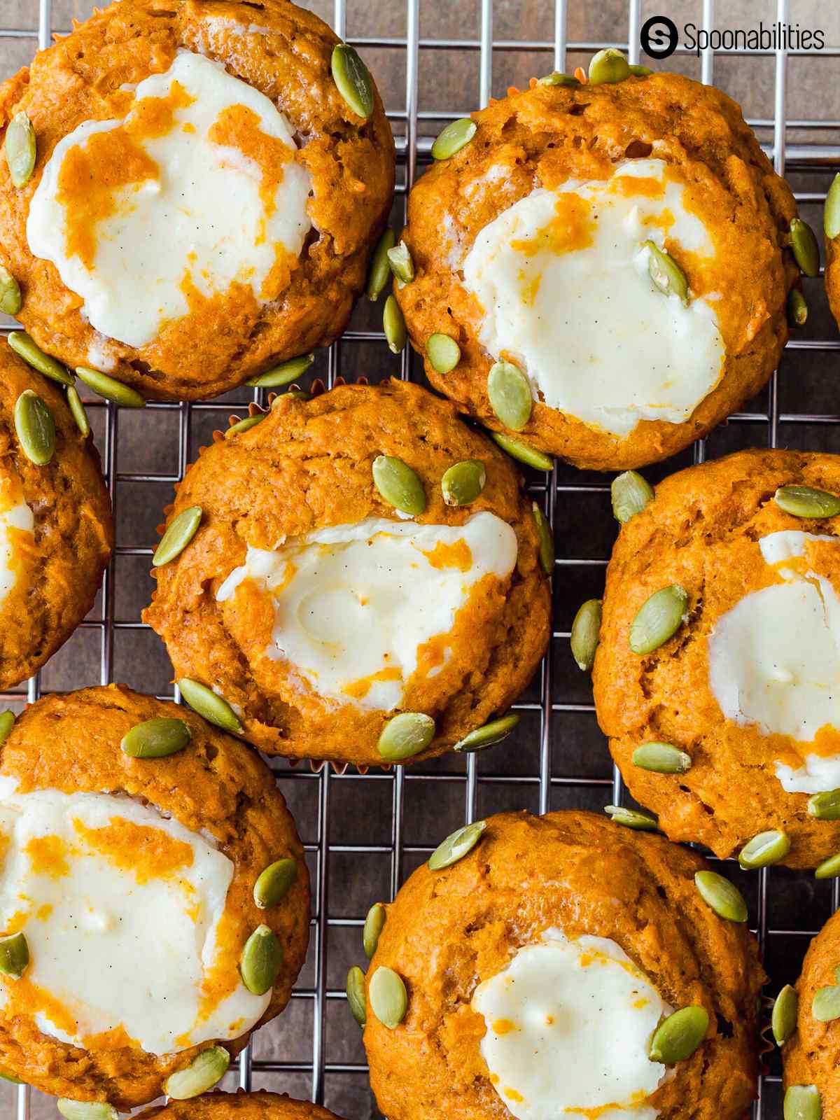 Close up shot of pumpkin muffins with cream cheese center
