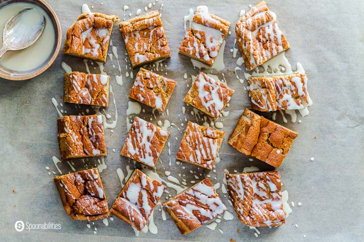 16 pieces of pumpkin magic cake with a Vermont Maple glaze over the top. Recipe at spoonabilities.com