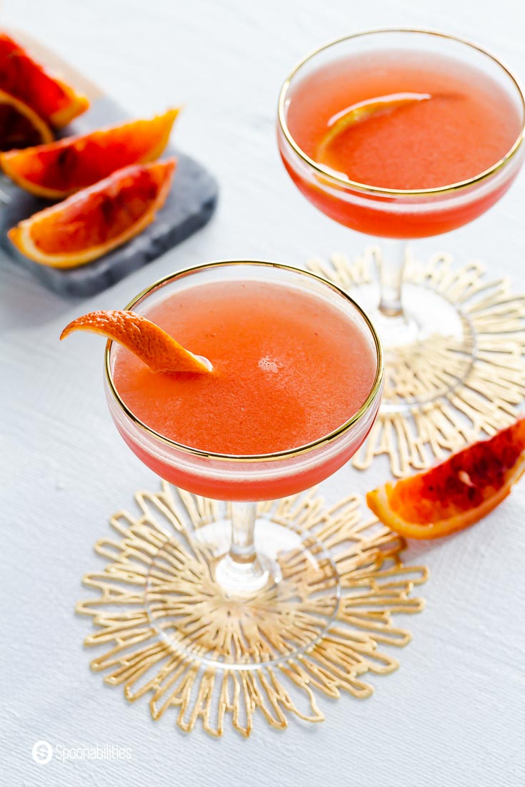Overhead photo of the Couple glass with blood orange liqueur. Recipe at Spoonabilities.com