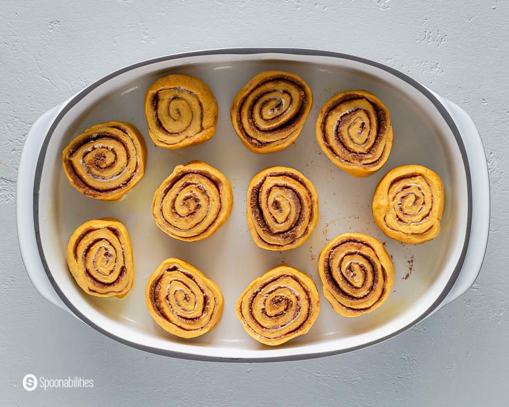 The cinnamon rolls in the baking dish before rising. Recipe at Spoonabilities.com