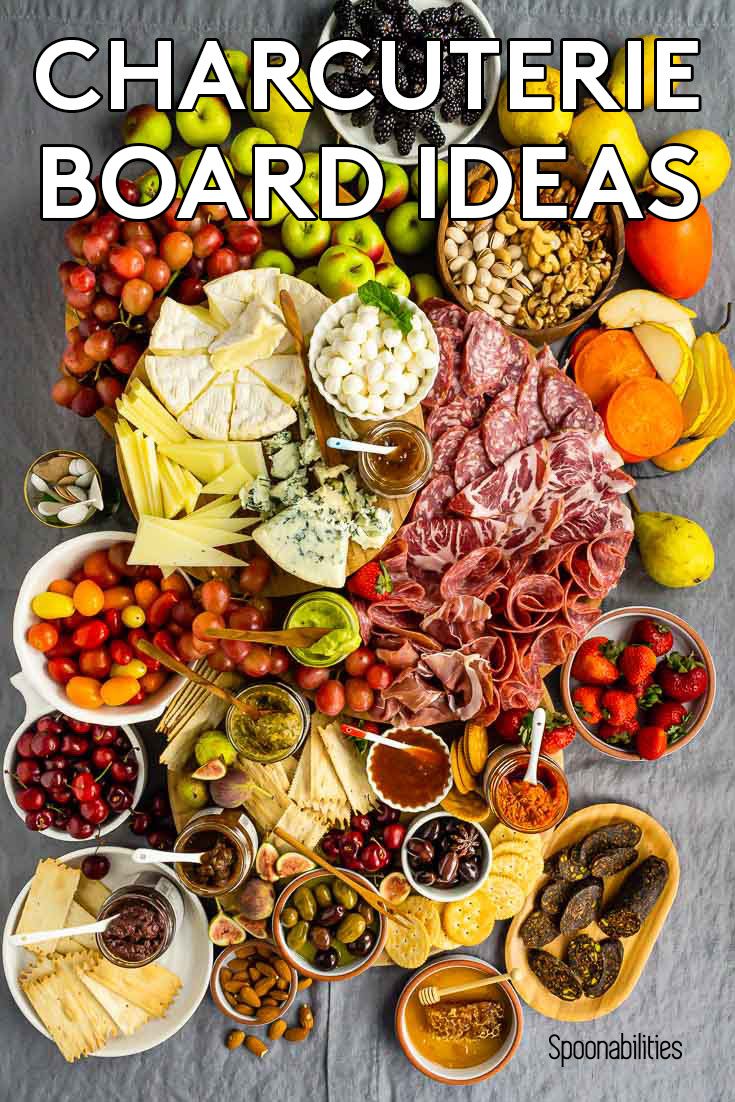 Charcuterie board ideas including meat, cheese, fruits and spreads