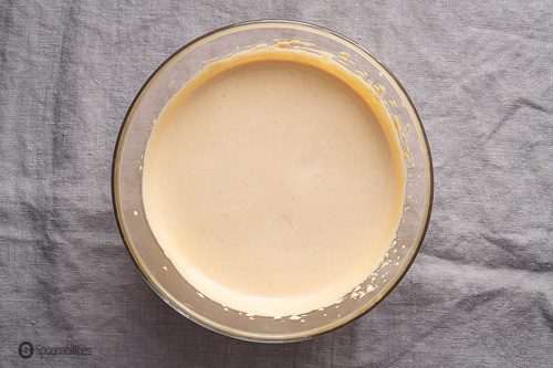 Chestnut custard mixture in a large mixing bowl ready to pour on the small ramekins. Recipe at Spoonabilities.com