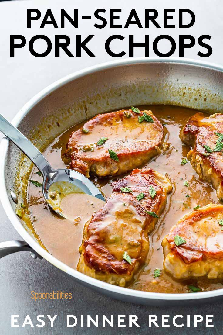 Close up photo of a half of a sauté pan with four pan-seared pork chops with apricot Dijon mustard sauce. Recipe at Spoonabilities.com