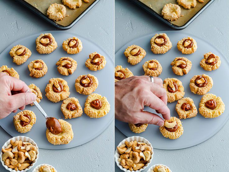 Two photos: the first photo adding the caramel sauce in the thumbprint cookies and the second one adding the whole cashew on top. Recipe at Spoonabilities.com